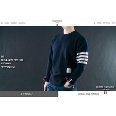 톰* 램스울 절개 사선 니트