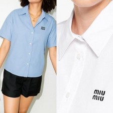 미*** 영문로고 반팔셔츠